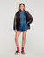 Shorts in denim con volant