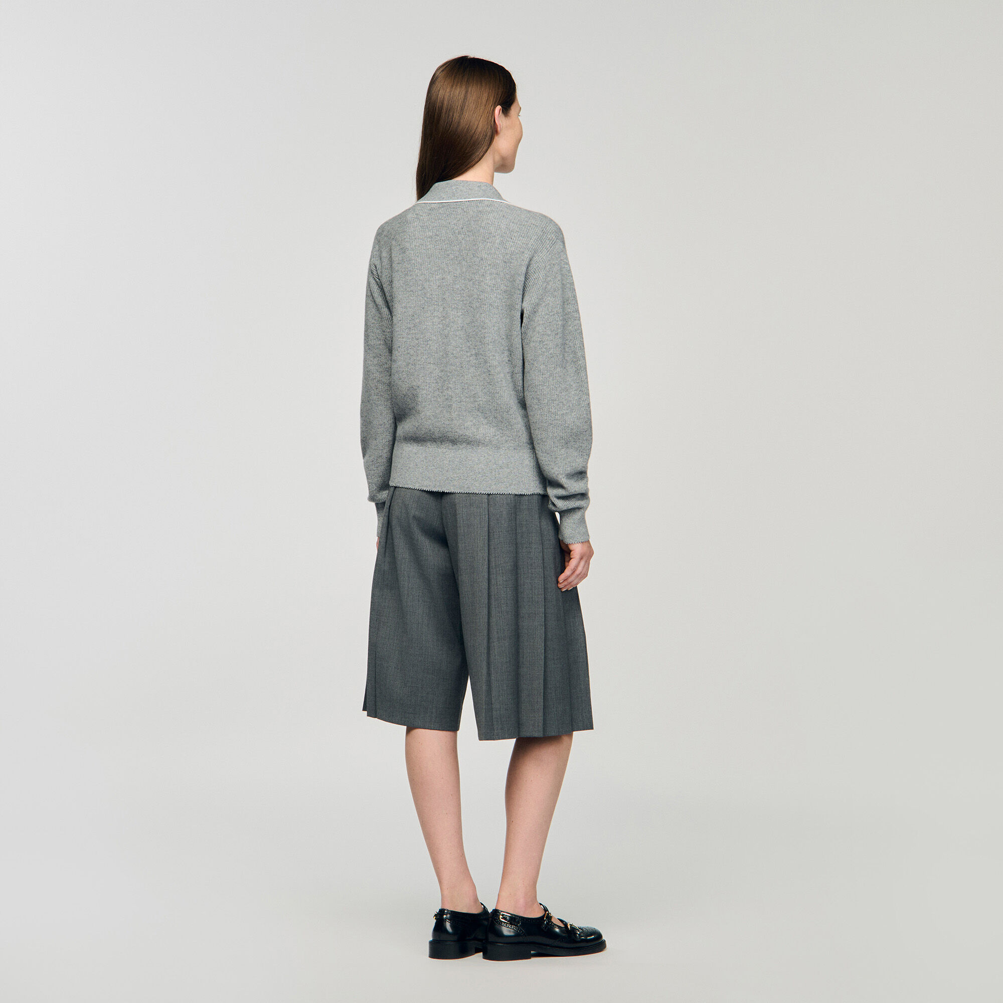 Maglione con colletto a polo aperto