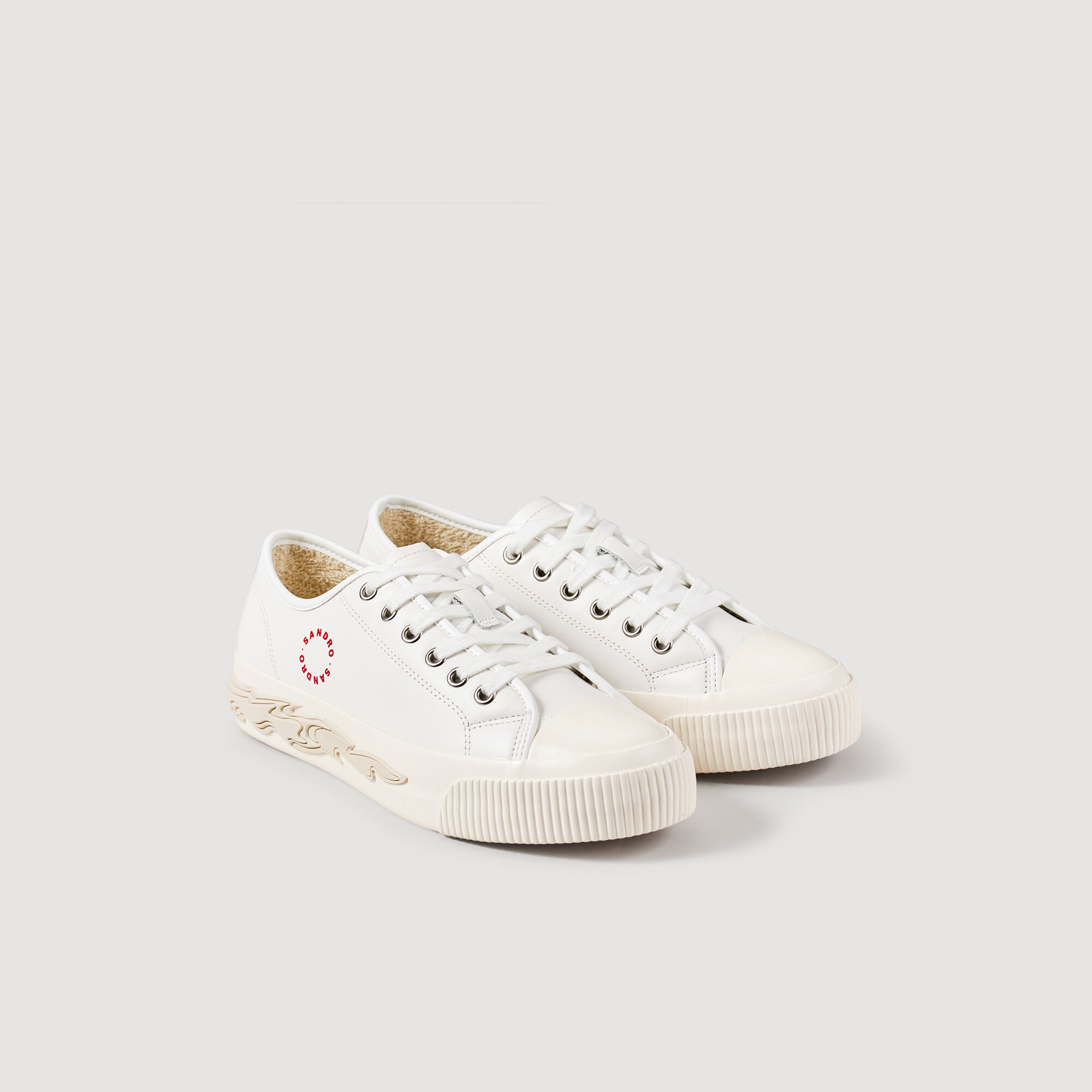 Sneaker in pelle con fiamma sulla suola