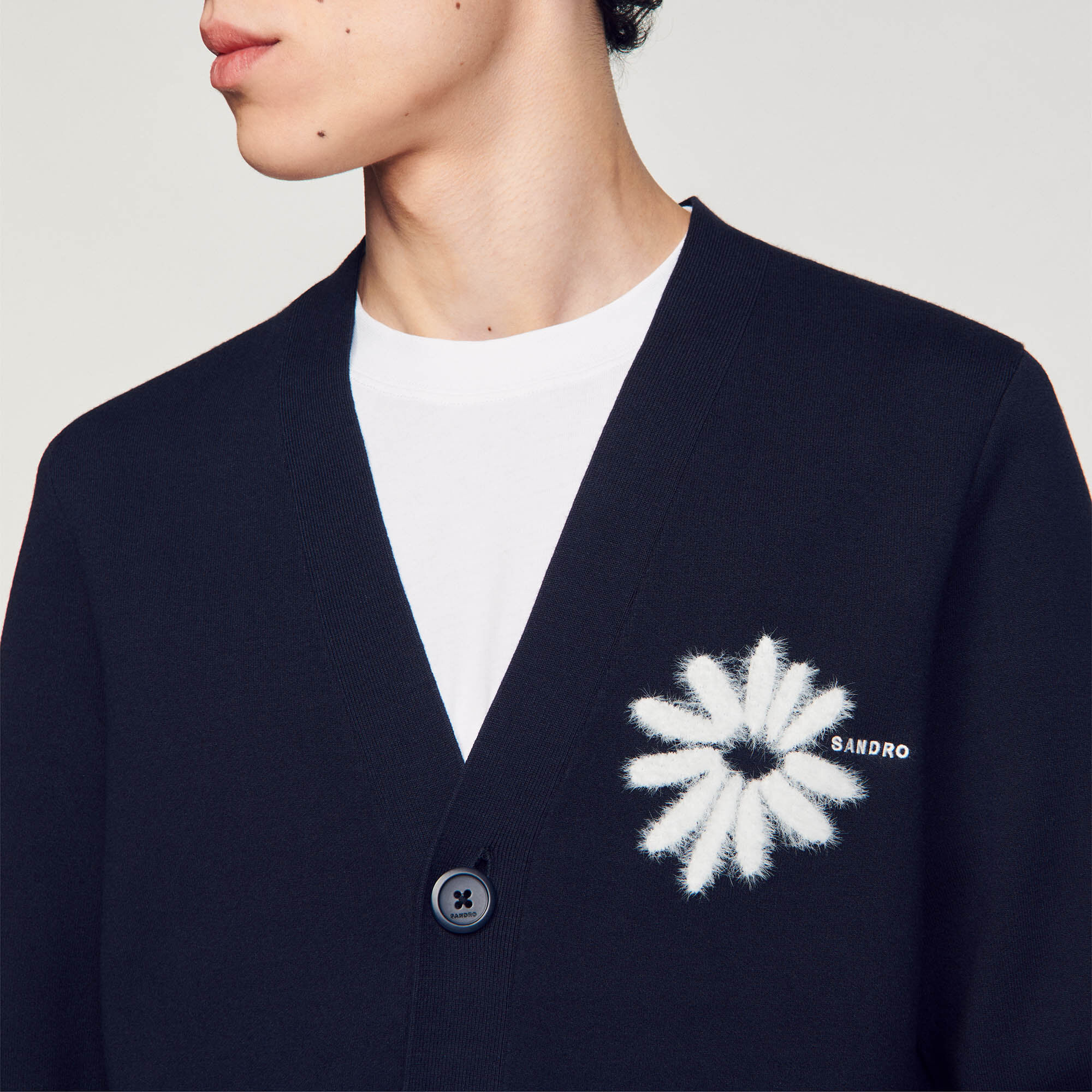 Cardigan in maglia con fiore in jacquard