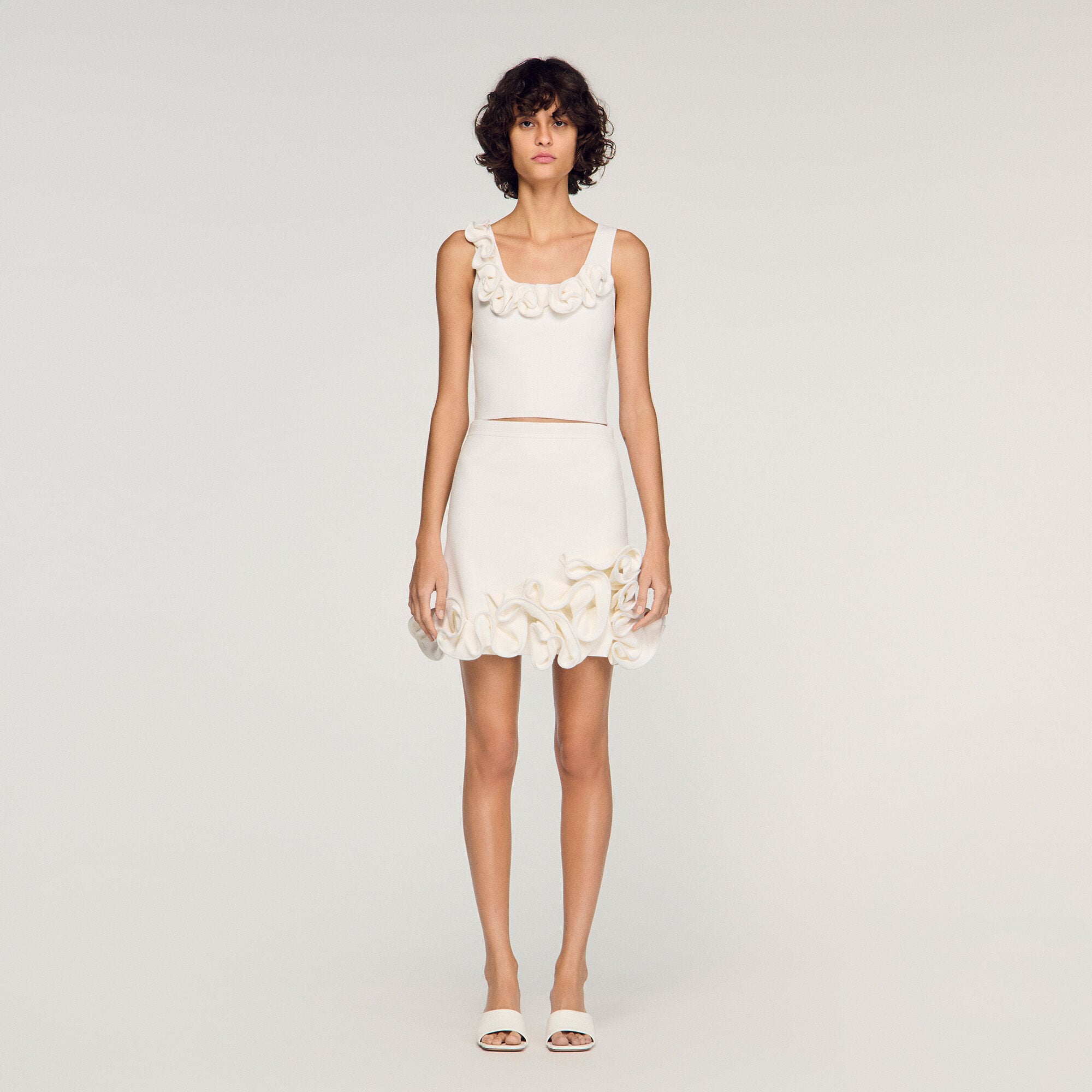 Top corto in maglia a fiori