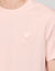 T-shirt con patch a cuore