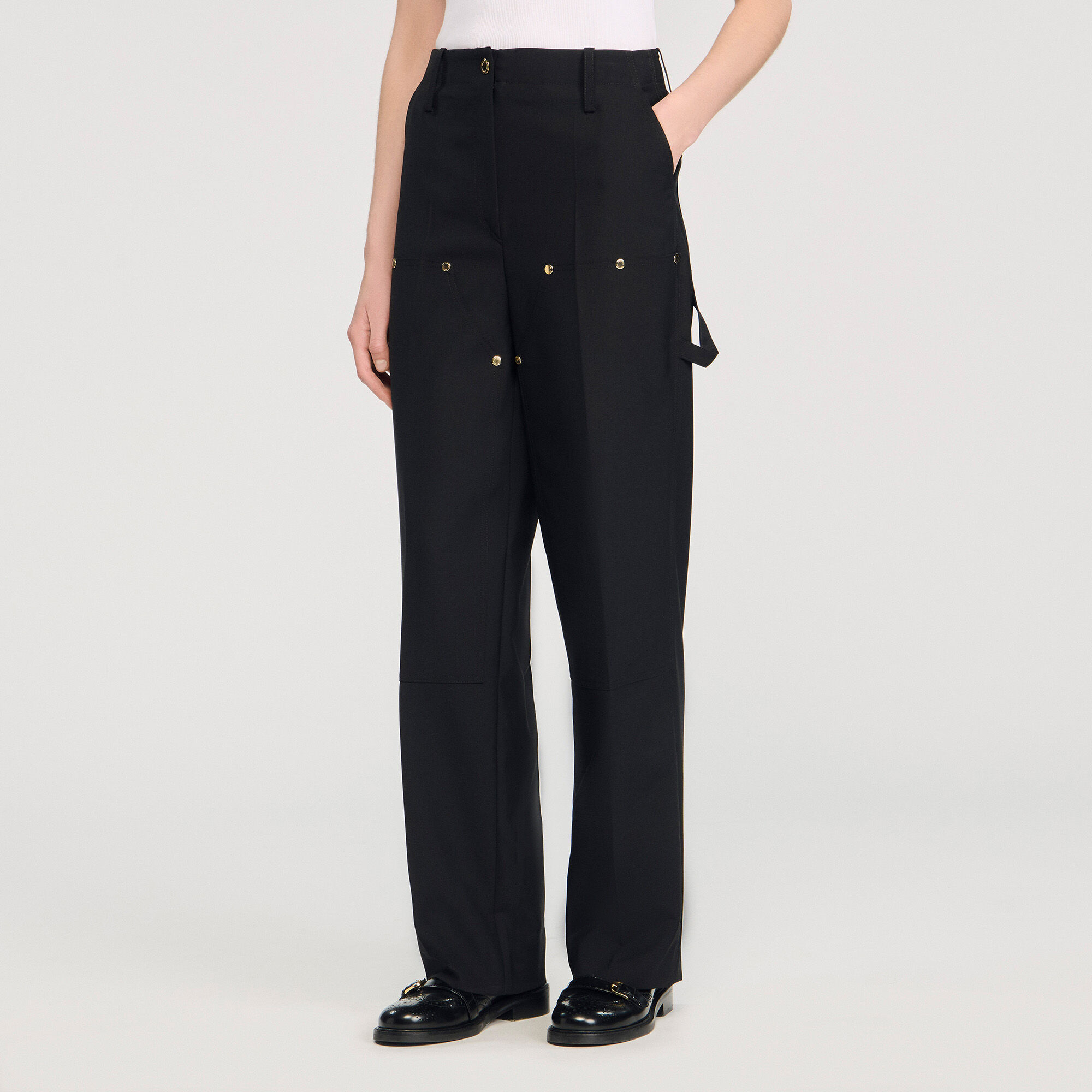 Pantaloni fluidi con rivetti