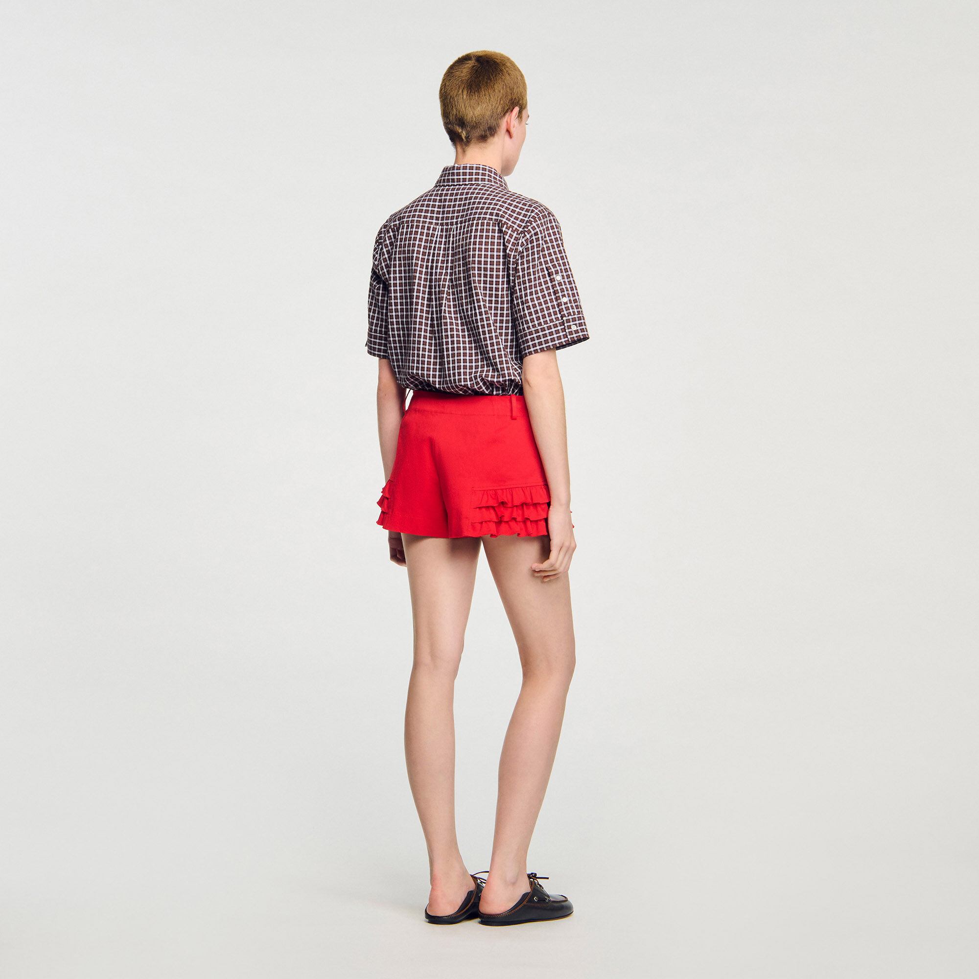 Shorts con volant