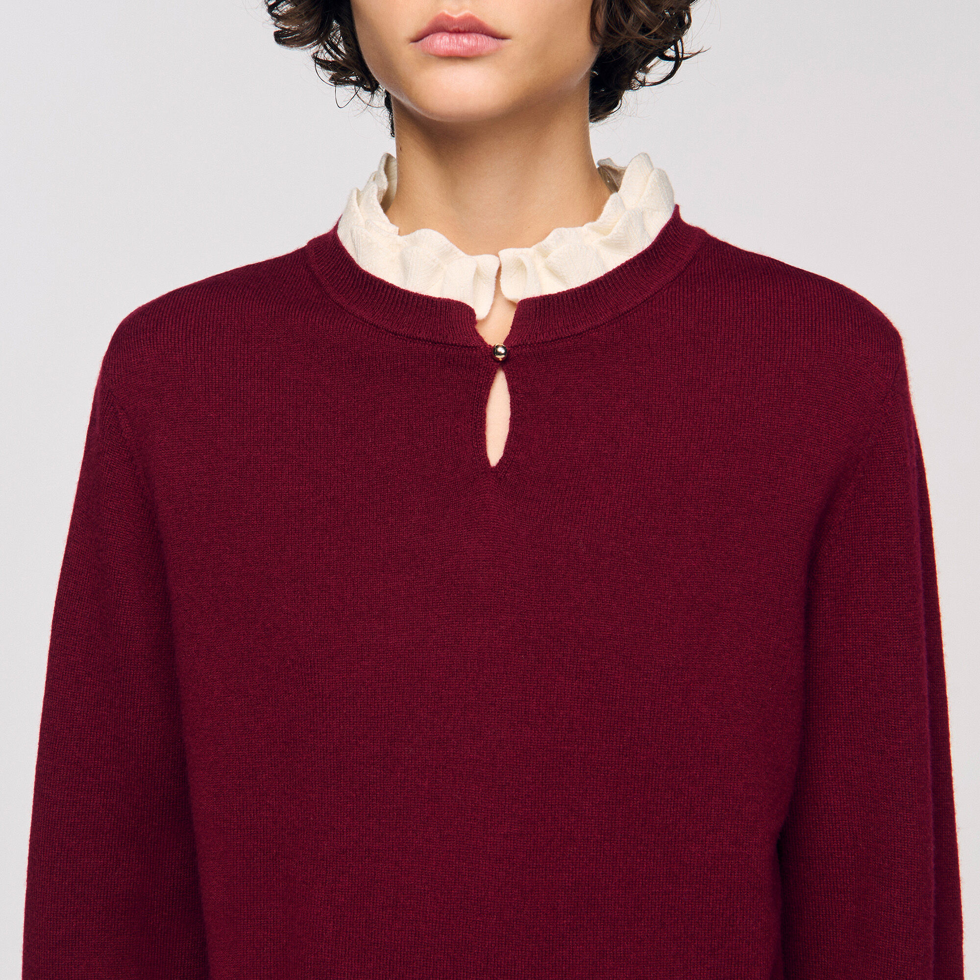 Maglione con collo arricciato