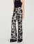 Pantaloni con stampa a fiori