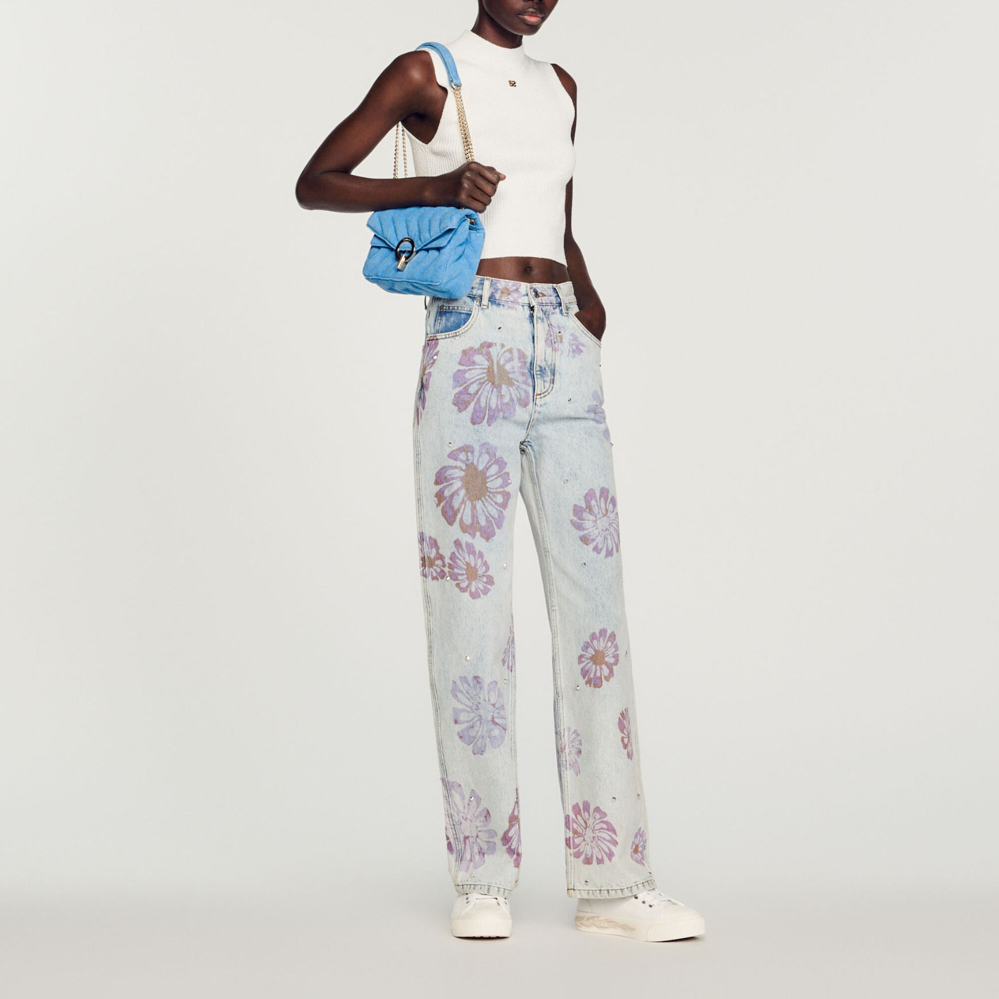 Jeans con motivi floreali