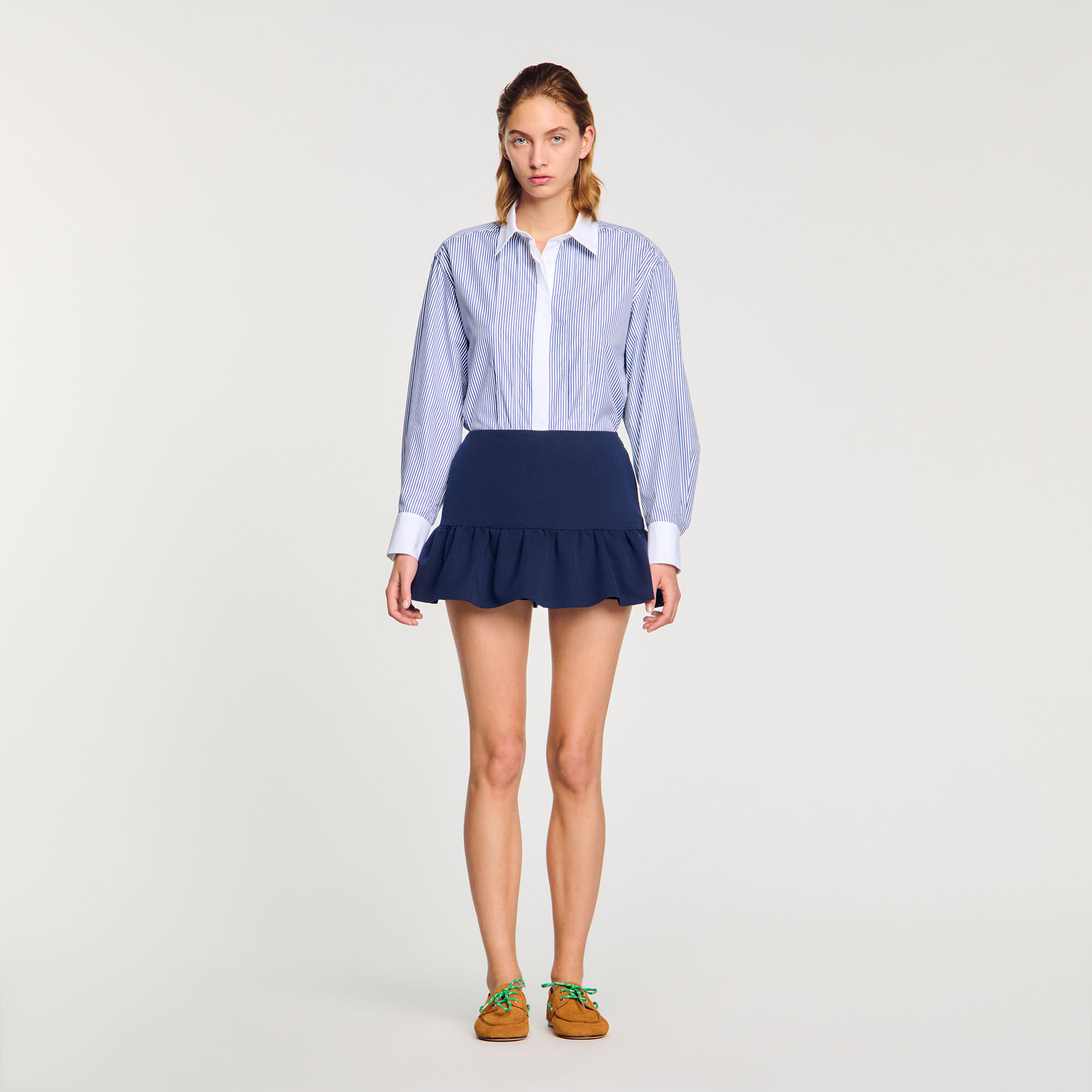 Shorts con volant