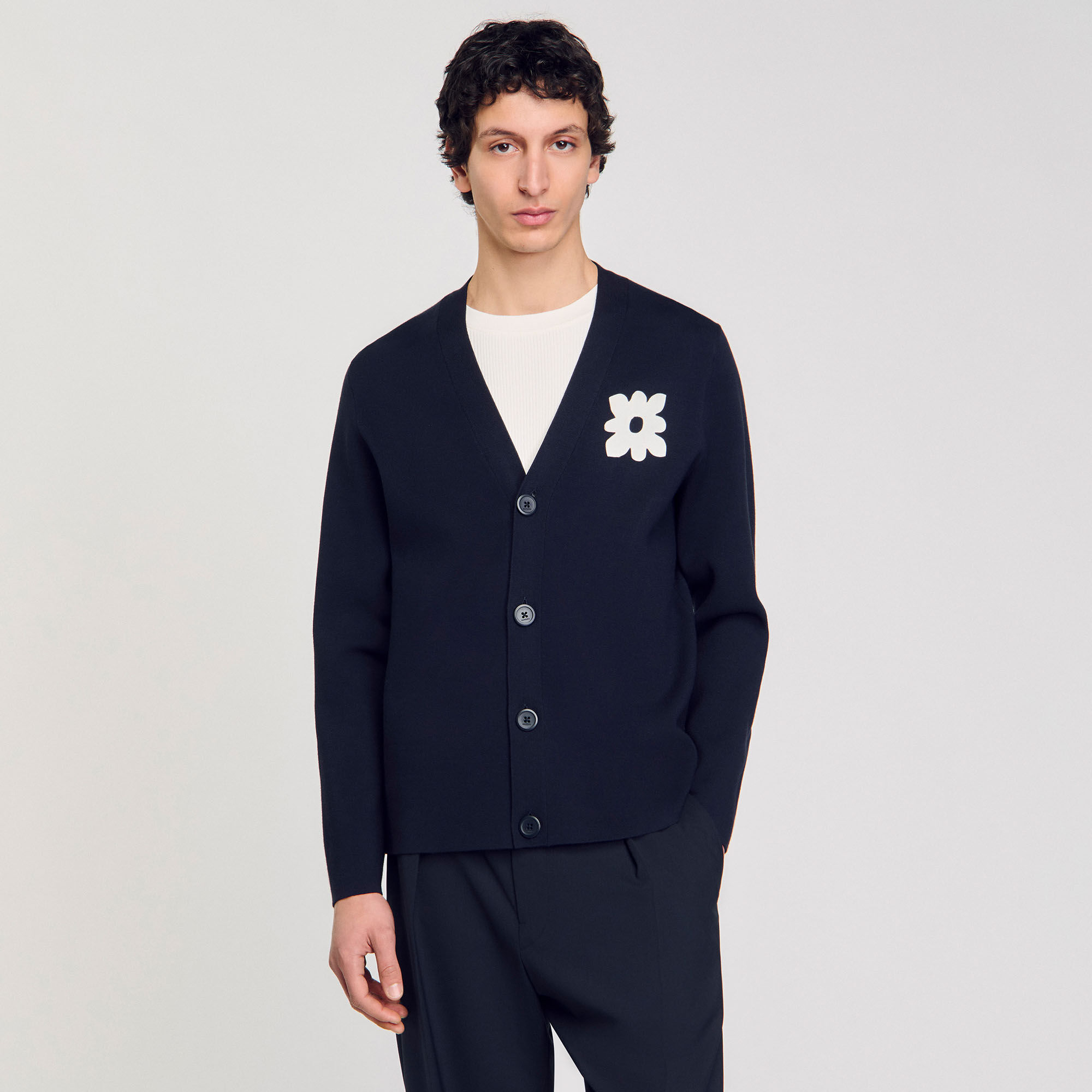 Cardigan con dettaglio a fiore
