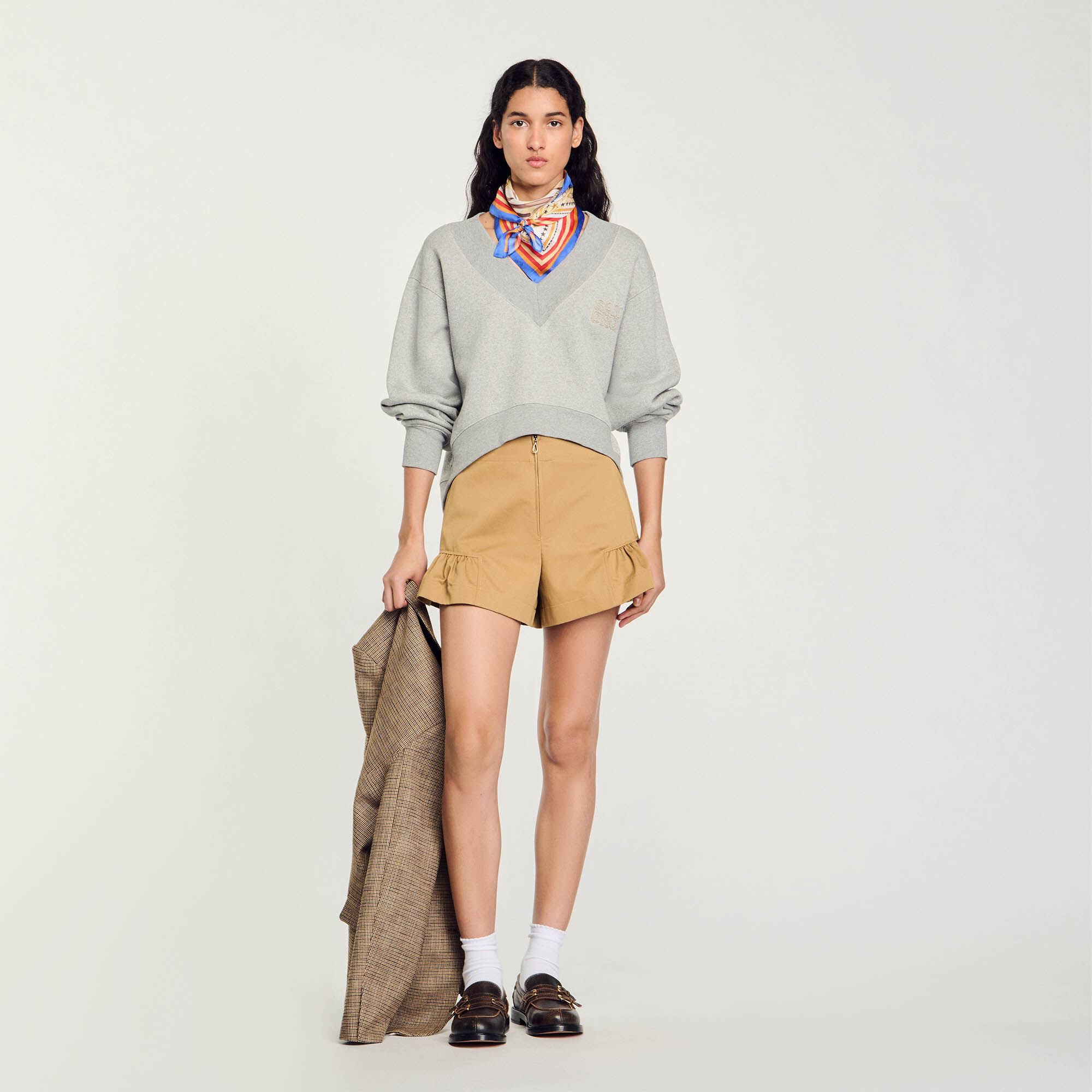Shorts con volant