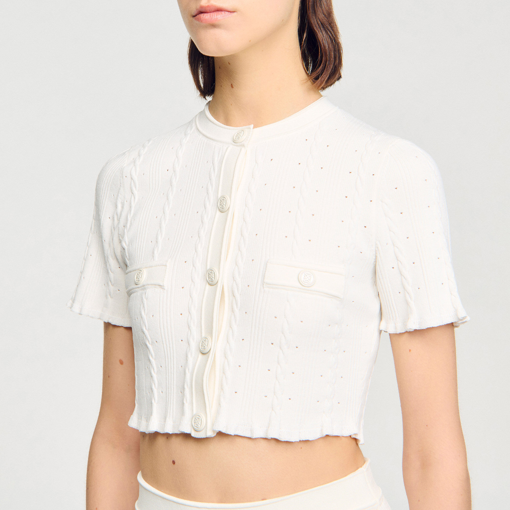 Cardigan corto in maglia pointelle
