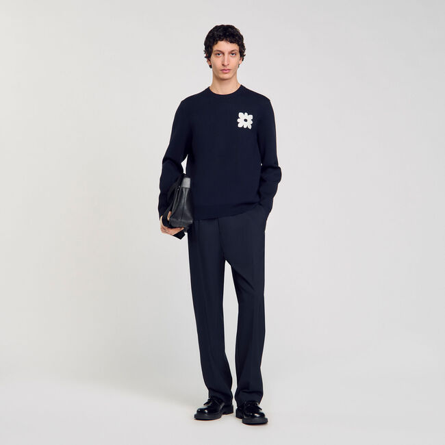 Maglione con dettaglio a fiore