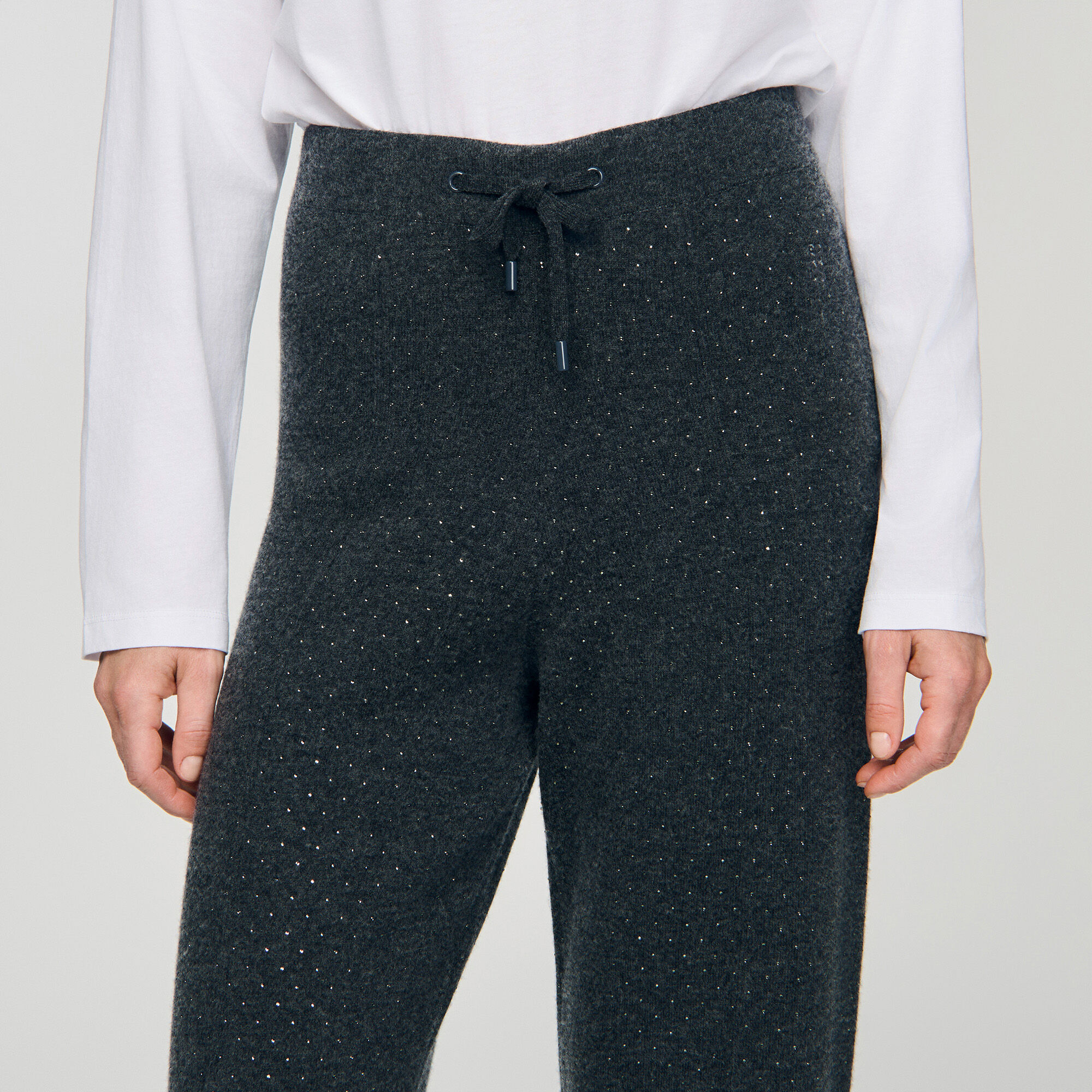 Pantaloni glitterati in maglia