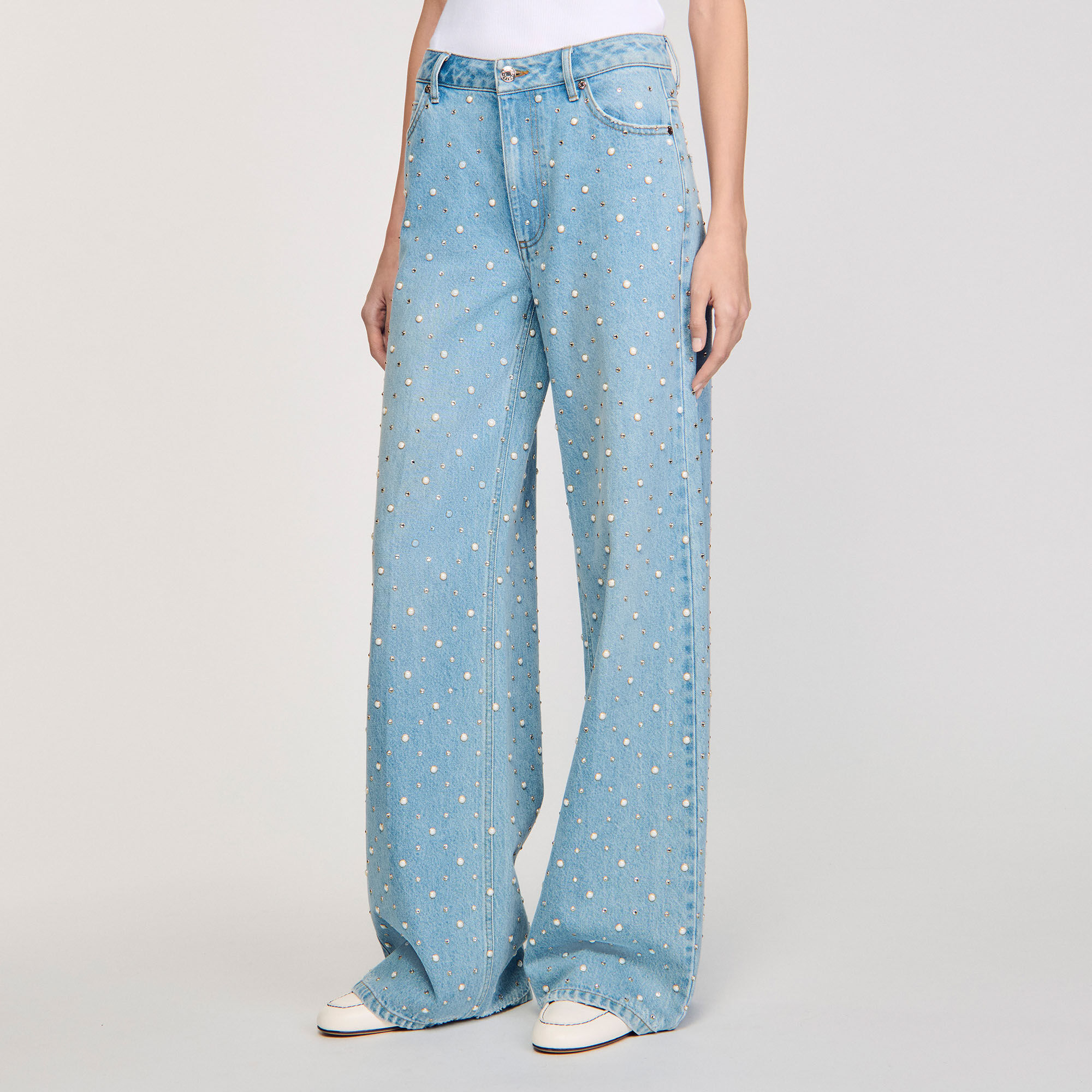 Jeans con strass e perline