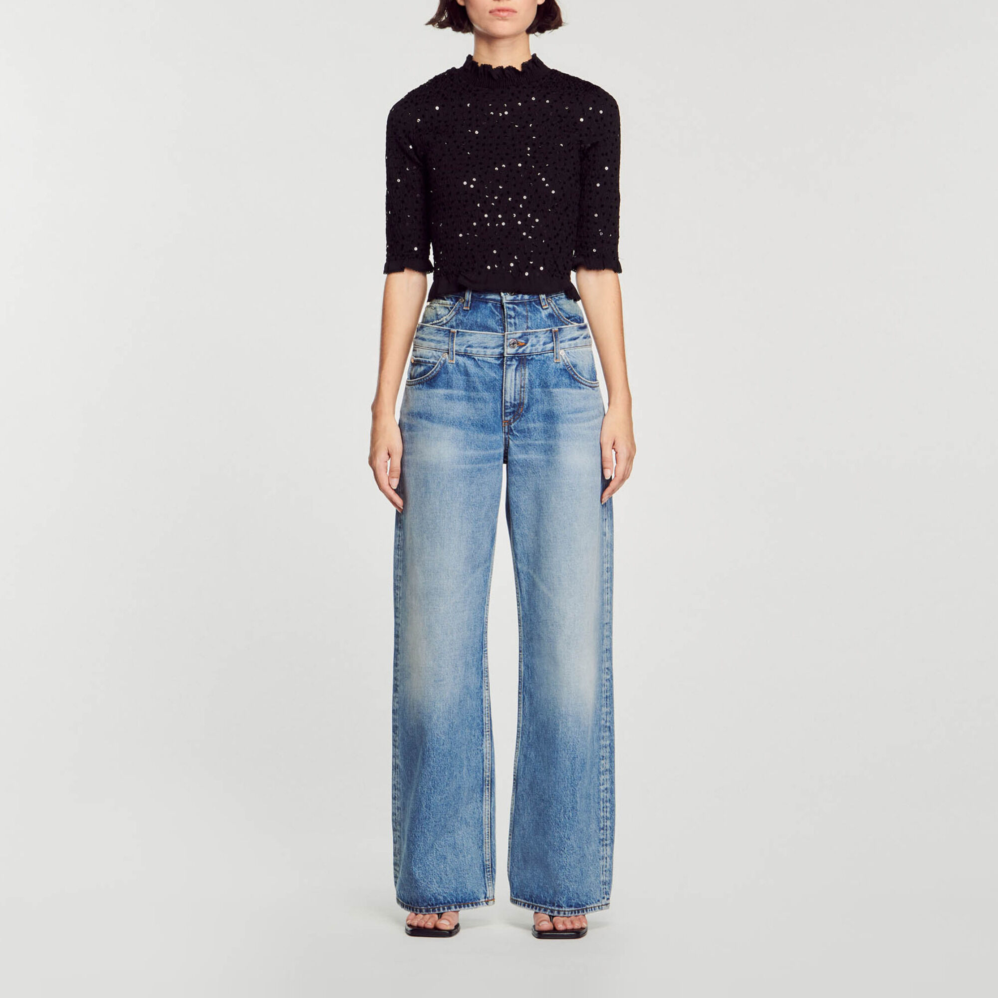 Top ornato da paillettes