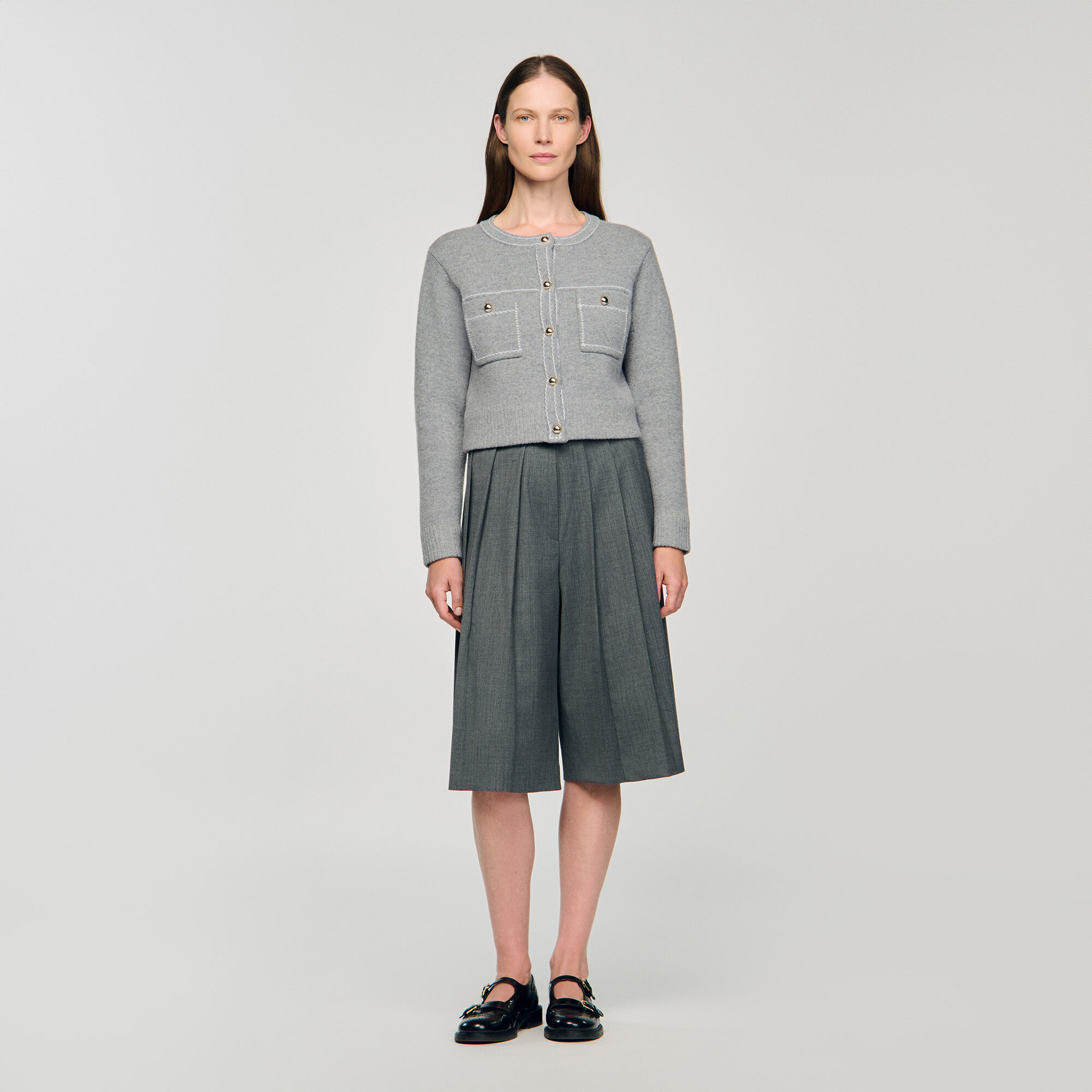 Cardigan con cuciture a contrasto