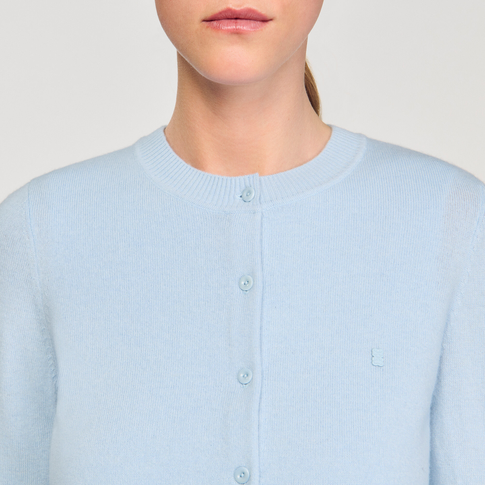 Cardigan con volant