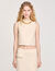 Top corto in maglia con collana
