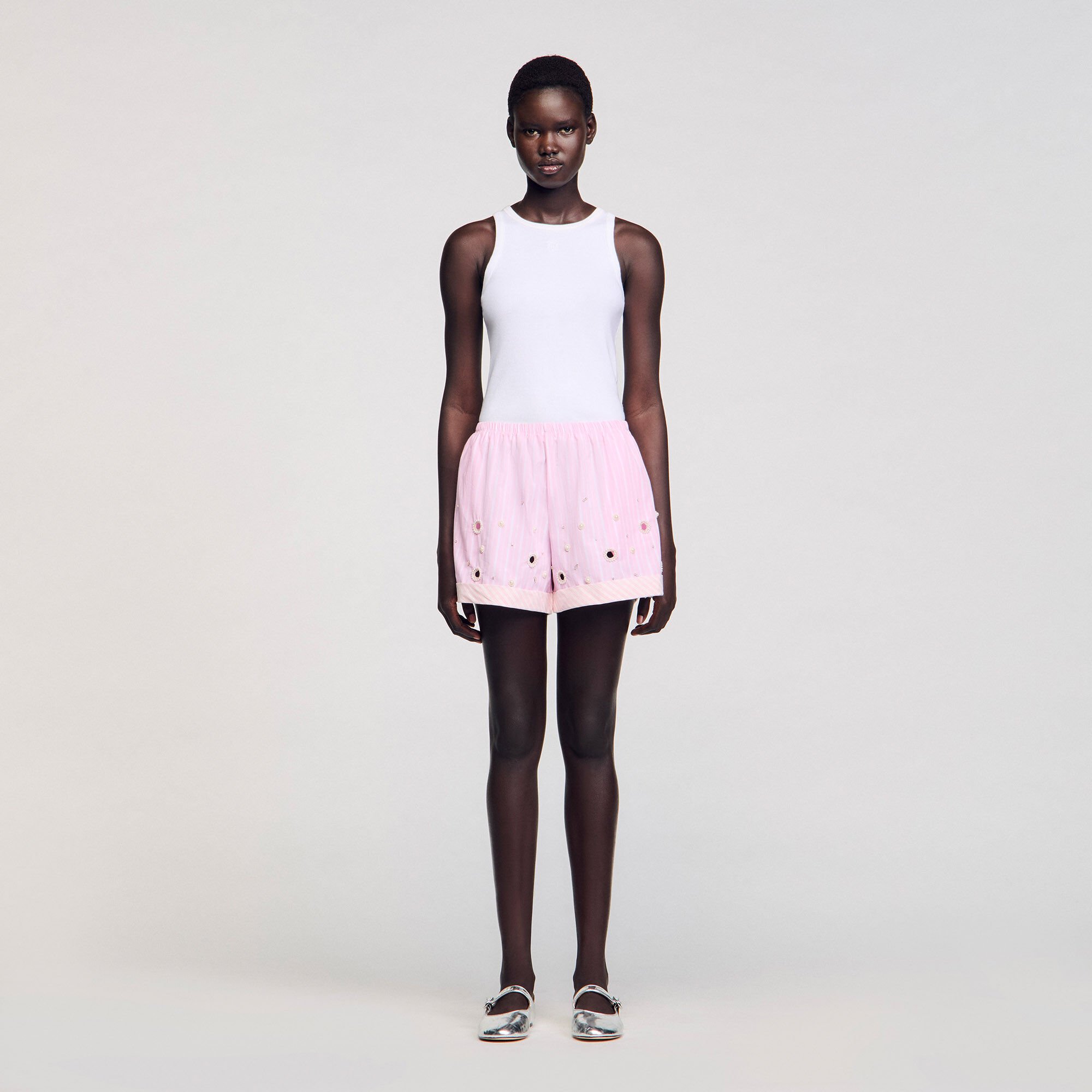 Shorts glitterati a righe