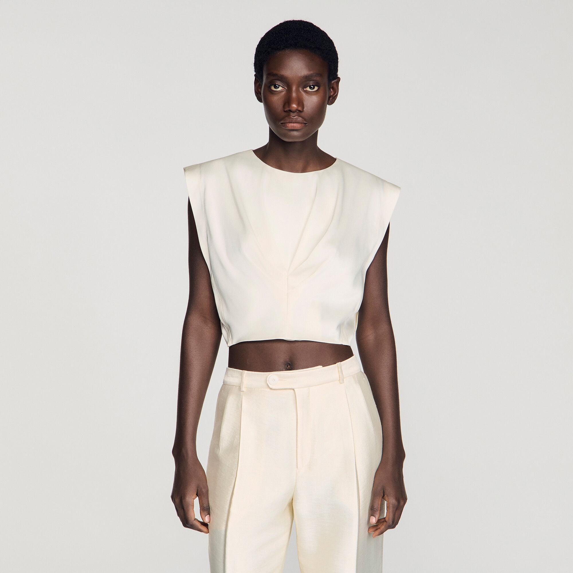 Top corto in raso plissettato