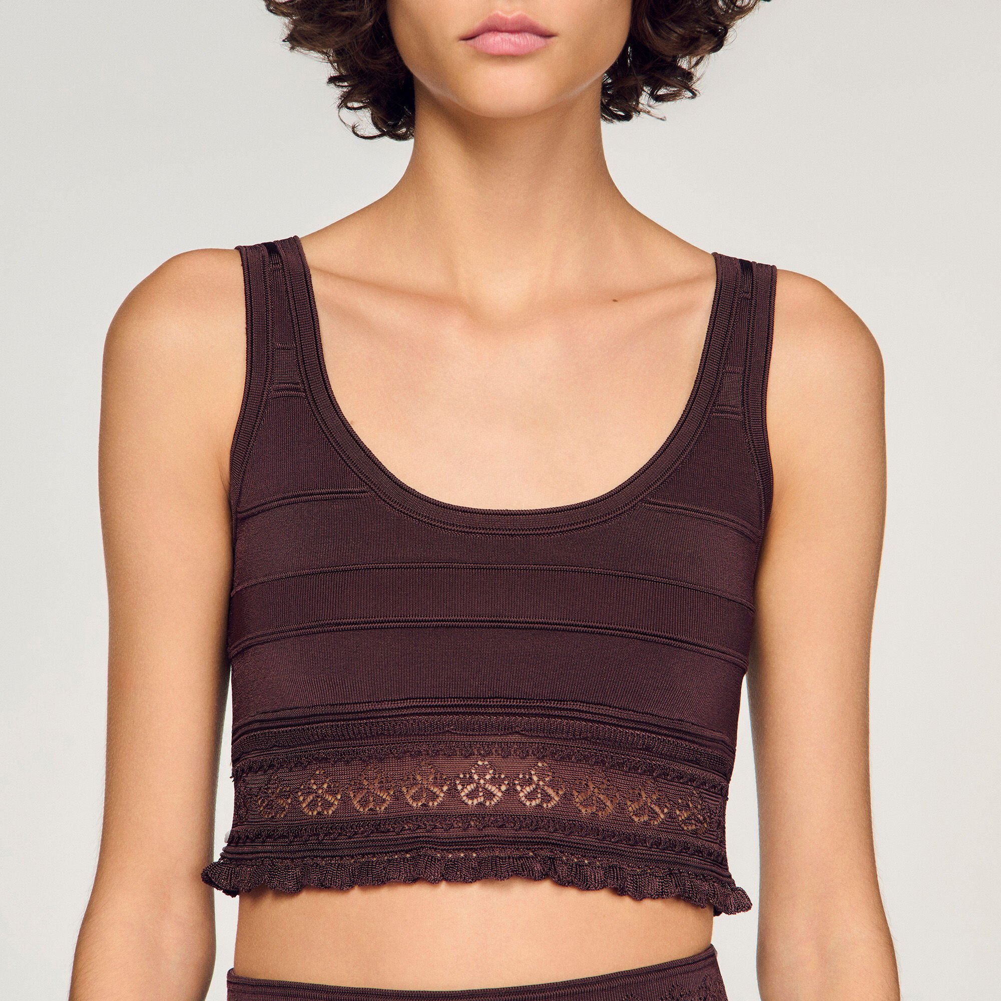 Top corto in maglia pointelle