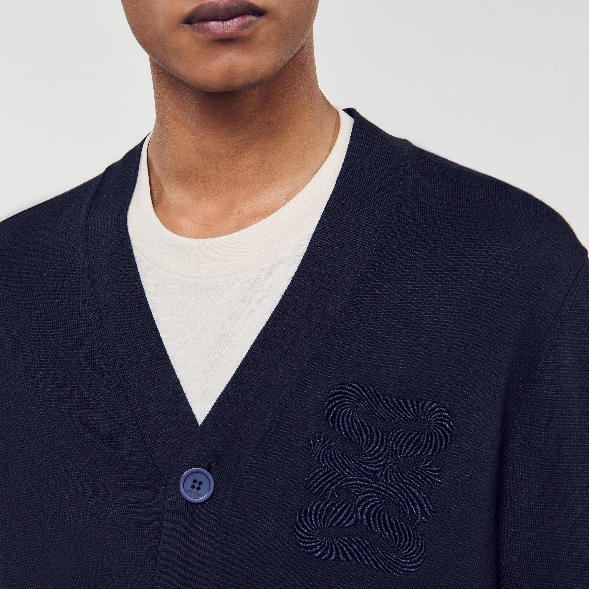 Cardigan con ricamo a corda