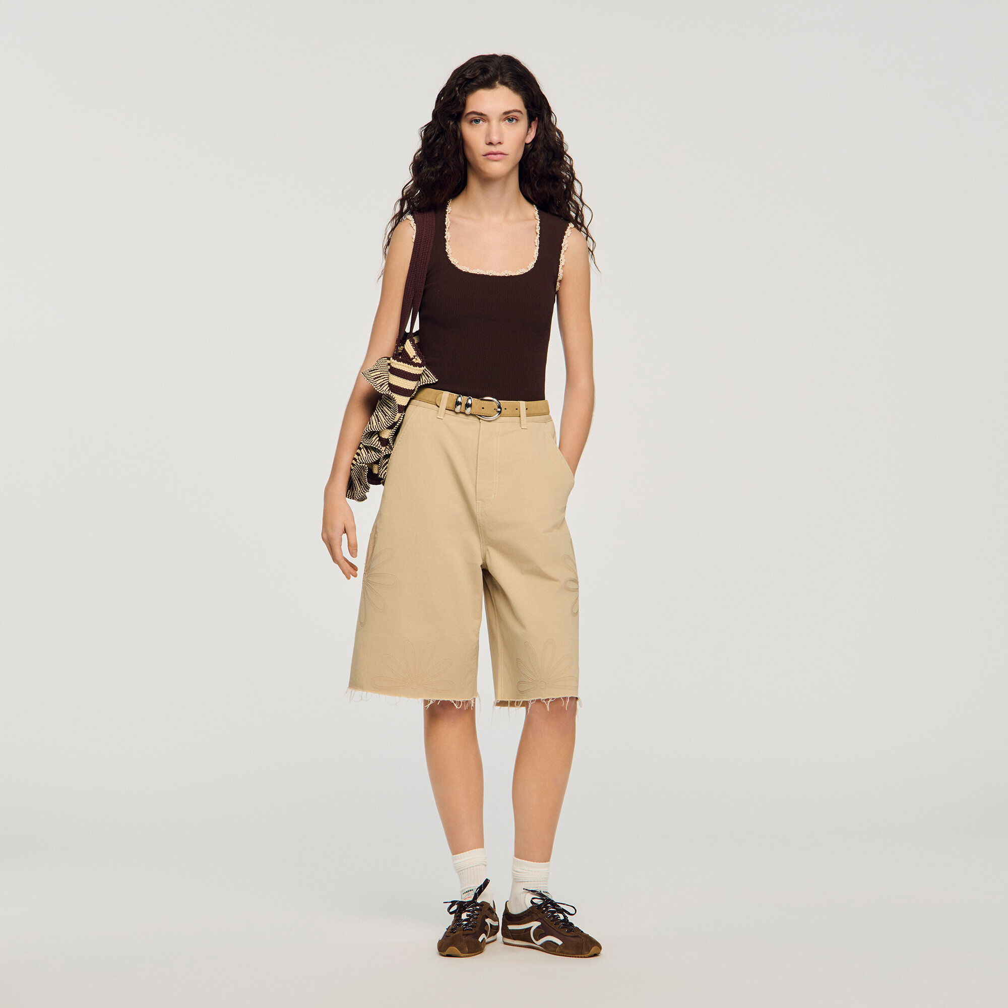 Top in maglia con dettagli crochet